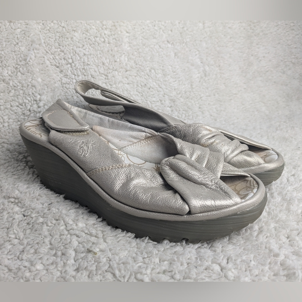 FLY LONDON Wedge women sandals size 37 = 6.5, 7 us color pale shinny gold